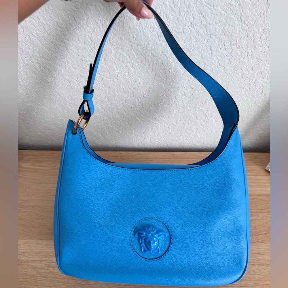Versace handbag. Miami blue color.